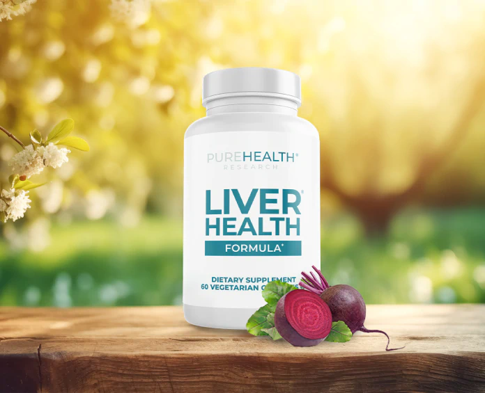 A bottle of PureHealth Research Liver Health Formula on a wooden surface, surrounded by fresh beets, representing the best supplements for liver health.