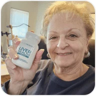 Customer photo holding product bottle