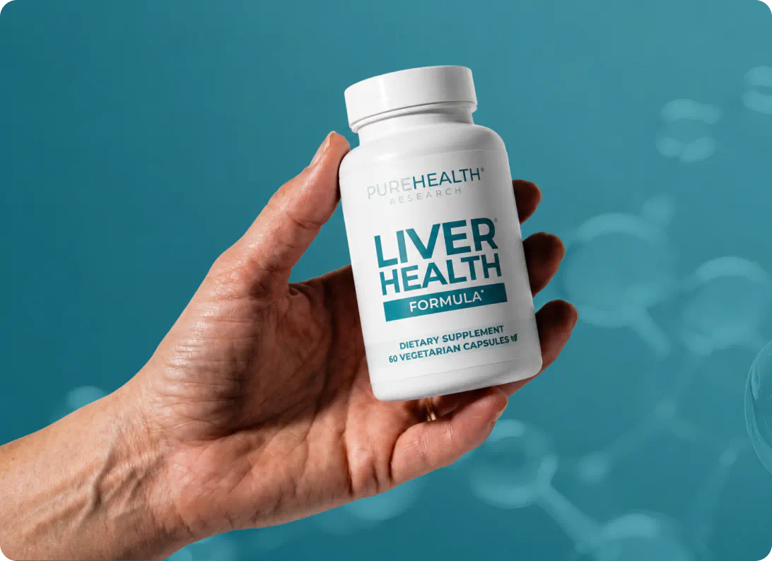 Hand holding Liver Health Formula bottle
